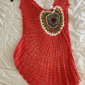 Crochet top with asymmetrical hem